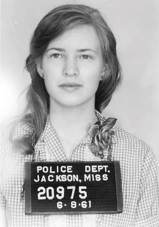 Photo of Joan Trumpauer Mulholland with mug shot